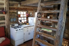 Steps-and-Kitchen-Homestead-Cabin-1024x576-1